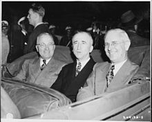 Secretary of State James F. Byrnes (center), President Truman (left) and Ambassador Sawyer, on the president's arrival in Antwerp en route to Germany to attend the Potsdam Conference. L to R, President Harry S. Truman, Secretary of State James Byrnes, and Ambassador to Belgium Charles Sawyer seated... - NARA - 198780.jpg