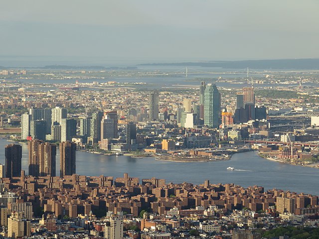 The expanding skyline of Long Island City in Queens with One Court Square as seen from across the East River opposite Stuyvesant Town–Peter Cooper Vil