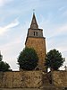 Kerk Saint-Martin en muur rond begraafplaats