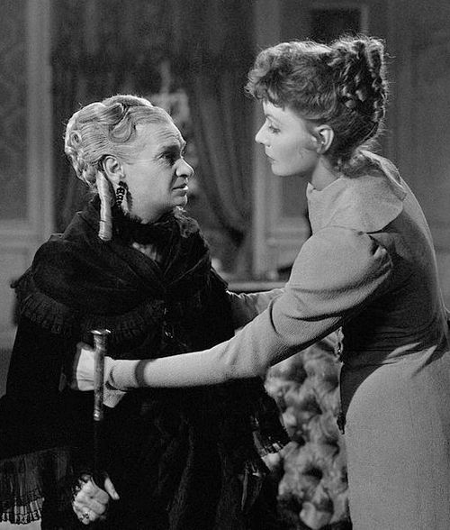 Maria Ouspenskaya's (left) grey hair in the 1937 film Conquest.
