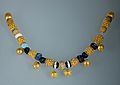Necklace. Gold and glass paste, Roman artwork, 6th–5th centuries BC.