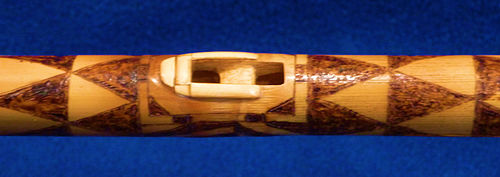 Nest area detail of the Tohono O'odham style flute shown above. The ridges on the sides of the sound mechanism were added by Pat Partridge to improve playability and are not found on authentic Tohono O'odham flutes. Nest area detail of flute by Pat Partridge crafted in the style of Tohono O'odham culture flutes.jpg