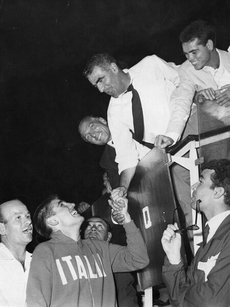 Benvenuti talks to his father Fernando at the 1960 Olympics