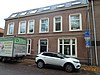 Woonhuis met bedrijfsruimte