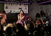 Otoboke Beaver performing at the SXSW Music Opening Party at The Main on March 12, 2019 (L-R: Yoyoyoshie, Accorinrin, Kahokiss [on drums], Hiro-chan)