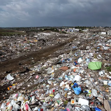 In the sky, a dark storm is raging and pollution is everywhere. The world is in anguish as it is being destroyed by the pollution. This picture shows the sad reality of how we are destroying our planet.