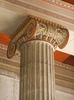 Ionic capital partially colored, inside the Propylaea (Munich, Germany)