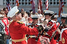 A bandmaster of the United States Marine Band on Memorial Day. Remembering the fallen at ANC on Memorial Day 150525-A-FT656-762.jpg