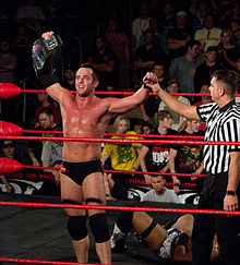 Strong is a former ROH World Television Champion in Ring of Honor. Roderick Strong ROH TV Champion.jpg