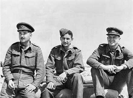 Lt. Robin Pare (left), squadron commander Major John "Jack" Frost (centre), who was the highest scoring ace in the SAAF during the Second World War, and Capt. Andrew Duncan (right) of 5 Squadron SAAF March/April 1942