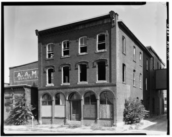 SOUTH ELEVATION (FRONT) AND EAST ELEVATION (SIDE) - T. L. Thorpe Building, 19 Traction Street, Manchester, Hillsborough County, NH HABS NH,6-MANCH,10-1.tif