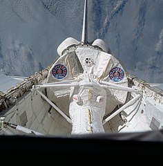 Shuttle Columbia during STS-9 with Spacelab Module LM1 and tunnel in its cargo bay