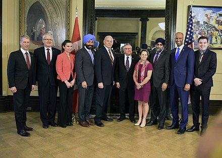 Garneau and other members of Trudeau's cabinet welcoming U.S. Secretary of Homeland Security John F. Kelly in March 2017
