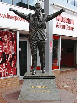 Statue of Bill Shankly outside Anfield. Shankly won promotion to the First Division and the club's first league title since 1947. Shankly statue out front.jpg