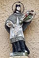 Nepomuki Szent János-szobor egy Krúdy Gyula utcai ház oromzatán