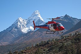 Tengboche, Helicopter in flight, Mountains of Nepal.jpg