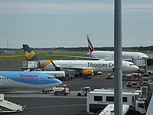 Aircraft belonging to Thomson, Thomas Cook and Emirates at the airport in 2014