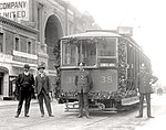 In 1917, possibly on Wattle Day (1 September), a garlanded Type B tram is in Currie Street. MTT General Manager W.G.T. Goodman is on the left. The Glenelg R'l'y sign shows it would turn right down King William Street to Peacock Road, where the "South Terrace" railway line to Glenelg had been foreshortened to limit the public nuisance of steam engines in the city streets. Type A tram no. 38 (garlanded), Currie Street, Adelaide 1917 (SLSA PRG-733-12).jpg