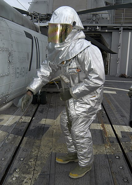 File:US Navy 080118-N-4649C-033 A Sailor wearing a fire-retardant suit checks for hot spots during a crash and smash drill aboard the guided-missile cruiser USS Shiloh (CG 67).jpg