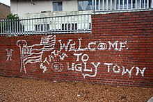 A large gang tag claiming control of the surrounding area for the Ugly Americans gang, a sub gang of the Americans gang, in Cape Town. Ugly American gang tag.jpg