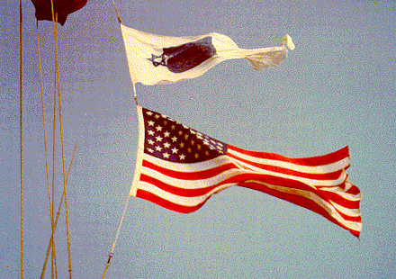 Jewish Worship Pennant, flying over the national ensign (U.S. flag) on a U.S. Navy ship.[2]