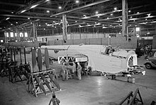 A Wellington bomber under construction at Vickers, Hawarden, near Chester, 1 June 1942 Vickers Wellington production - Royal Air Force 1939-1945 Bomber Command CH5987.jpg