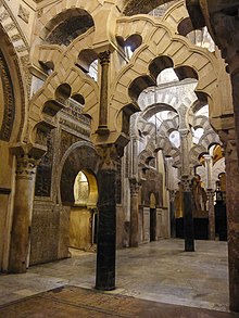 The horseshoe arches and interlacing arches of the Great Mosque of Cordoba in Spain. Started in 785 and expanded up to the 10th century, the mosque had great influence over subsequent architecture in the region. WLM14ES - 17102009 173439 CRDB 1474 - .jpg