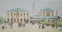 Bahnhofsgebäude von 1856, rechts davon die Einsteighalle, dahinter die Mechanische Baumwoll-Spinnerei