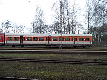 Letzter reinorange-kieselgrauer x-Wagen, abgestellt auf dem Gelände des Bahnbetriebswerks Krefeld