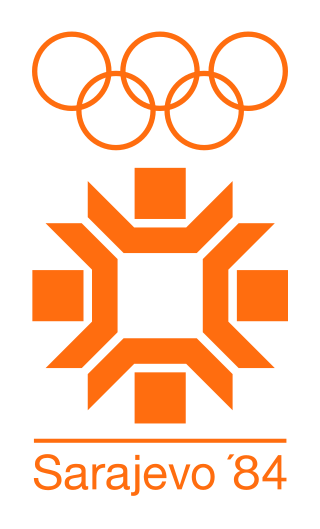 Logo der Olympischen Winterspiele 1984 mit den olympischen Ringen