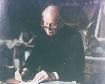 File:Rostislav Doboujinsky drawing in his studio.jpg