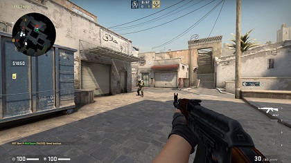 An in-progress match on Dust II, in which the player is using an AK-47