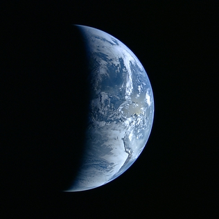 First optical still captured by the onboard HDTV camera. Earth is seen at a distance of 11,000 km [15]