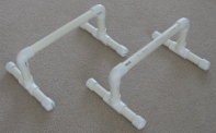 A set of parallettes constructed from PVC pipe. Parallettes.jpg