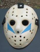 The hockey mask design used in A New Beginning. Unlike the one worn by main series antagonist Jason Voorhees, which has red stripes, this model has blue stripes; a subtle hint for the audience that the killer in the film is not Jason.