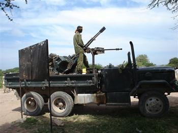 File:Transitional Federal Government soldier (Somalia) on a technical at the Battle of Jowhar.jpg