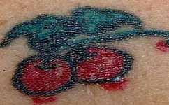 File:Cherries tattoo on unidentified murder victim.jpg