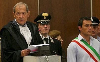 The Court d'Assise President, Raimondo Romeres reads out the verdict of the final sentences on 19 June 2008. (Photo:EPA) SpartacusTrialVerdict.jpg