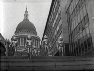 The Cybermen as they emerge from the sewers onto the streets in their first invasion of Earth as seen in The Invasion (1968)