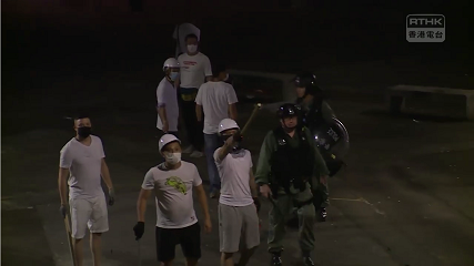 File:721 riot police ignore white shirt thugs with wooden stick 427 240.png