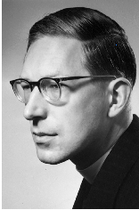 Young man with spectacles and Brylcreemed hair
