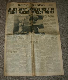 A Dayton Daily News headline dated August 12, 1945 announcing the atomic bombing of Hiroshima and Nagasaki, Japan.