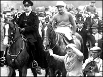 File:Fred Winter on Sundew after winning the 1957 Grand National.gif