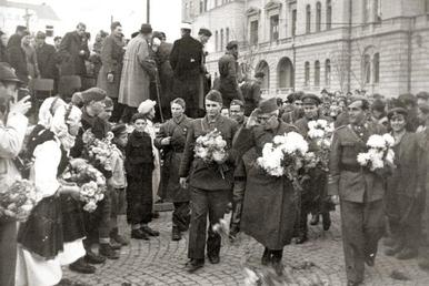 Dimitar Vlahov, Mihajlo Apostolski, Metodija Andonov-Čento, Lazar Koliševski and others, greeted in Skopje on 20 November 1944, a week after its liberation[100]