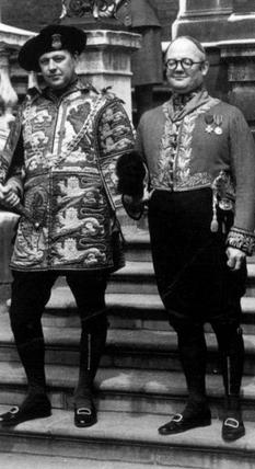 Sir Colin Cole standing with John Brooke-Little (right) on the steps of the College of Arms on the occasion of the Investiture of the Prince of Wales in 1969.