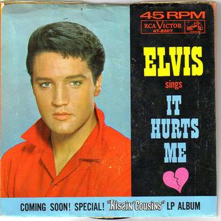 It Hurts Me 1964 song performed by Elvis Presley