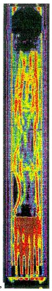 This is a false colour tomography picture of a bundle (FPT1) of 18 irradiated fuel rods (23 GWd/tU mean burn-up) degraded under steam as part of the PHEBUS set of experiments. The black and blue is for areas of low density while red is an area of high density. It can be seen that the fuel has failed mechanically and has formed a pool near the bottom of the bundle, the bottom of the bundle did not melt. FPT1fueltestPhebus.png