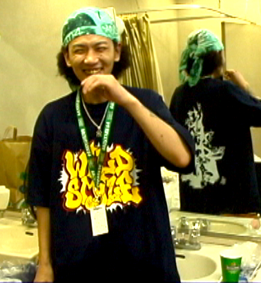 Japanese Hip-Hop fan wearing Wild Style T-shirt in Yoyogi park