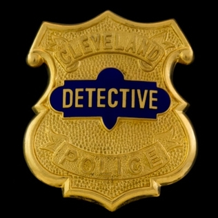 File:CLE PD badge.jpg