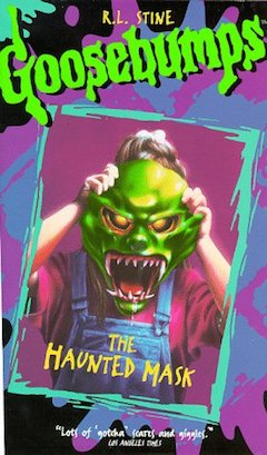 Cover art dari VHS, yang menunjukkan seorang gadis memegang hijau Halloween masker di wajahnya